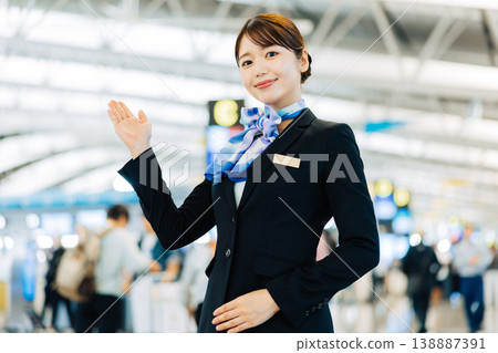 Female airport ground staff providing guidance. (Photography courtesy of Kansai International Airport (KIX)) 138887391