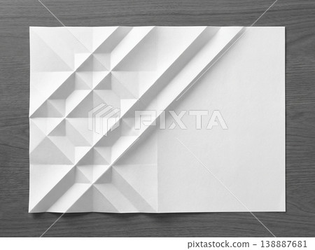 A white paper texture background with geometric folds and strong shading. A white paper texture background with geometric folds and strong shading. 138887681