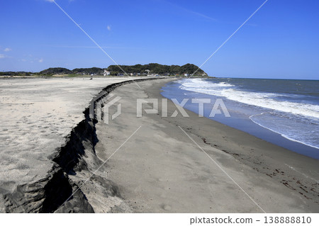 A view of Taitozaki and Izumiura coast from near the Isumi River estuary embankment. 138888810