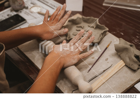 Hands Shaping Clay in Ceramics Art Class Hands Shaping Clay in Ceramics Art Class 138888822