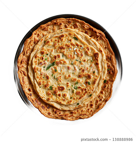 Paratha flatbread isolated stacked golden brown indian flatbreads on a black plate cut out on a transparent background 138888986