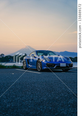 Mount Fuji at sunset and a blue sports car Mount Fuji at sunset and a blue sports car 138889172