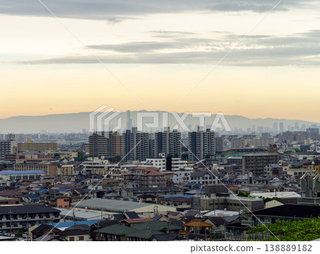 Early morning cityscape seen from a hill Early morning cityscape seen from a hill 138889182