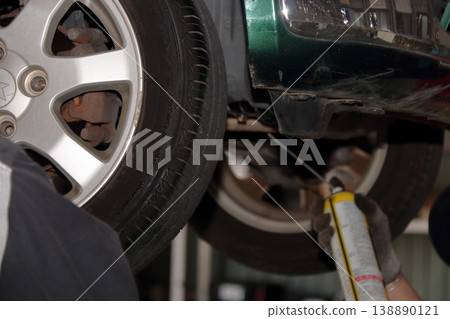Automotive inspection, maintenance, and repair shop, repair technician, mechanic Automotive inspection, maintenance, and repair shop, repair technician, mechanic 138890121