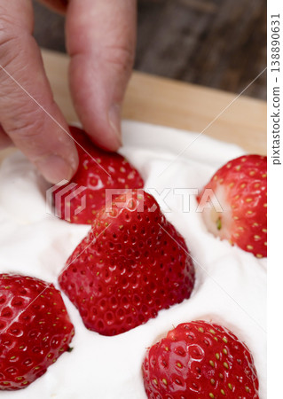 The process of making a strawberry fruit sandwich The process of making a strawberry fruit sandwich 138890631