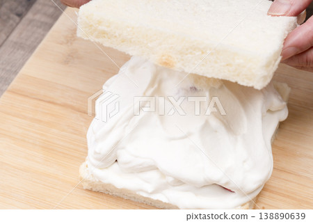 The process of making a strawberry fruit sandwich The process of making a strawberry fruit sandwich 138890639