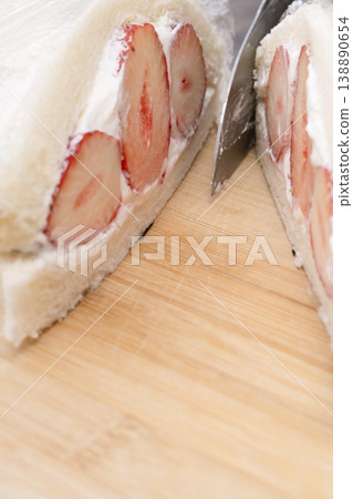 The process of making a strawberry fruit sandwich The process of making a strawberry fruit sandwich 138890654