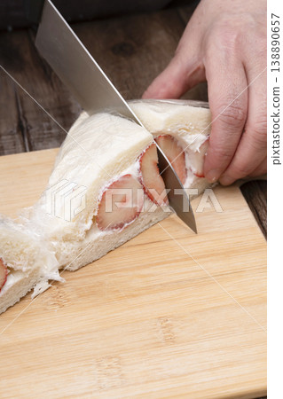 The process of making a strawberry fruit sandwich The process of making a strawberry fruit sandwich 138890657