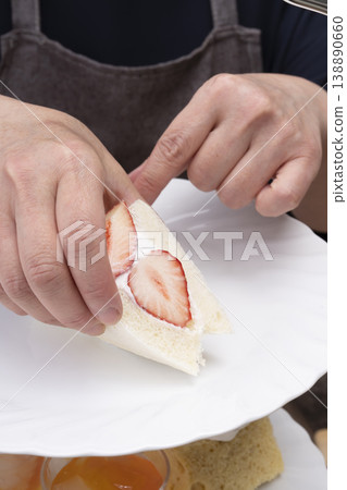 The process of making a strawberry fruit sandwich The process of making a strawberry fruit sandwich 138890660
