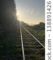Sunset viewed from the railway tracks 138891426