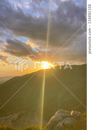 Warm sunset light illuminates Fuengirola city and coastline, viewed from South Viewpoint on Mount Calamorro. Warm sunset light illuminates Fuengirola city and coastline, viewed from South Viewpoint on Mount Calamorro. 138892108