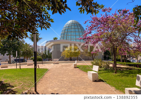 A lush orchid greenhouse filled with exotic blooming plants and vibrant colors creates a humid tropical atmosphere under glass in Estepona, Spain A lush orchid greenhouse filled with exotic blooming plants and vibrant colors creates a humid tropical atmosphere under glass in Estepona, Spain 138892355