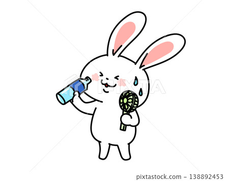 Heatstroke prevention: A rabbit stays cool by staying hydrated and using a portable fan. Heatstroke prevention: A rabbit stays cool by staying hydrated and using a portable fan. 138892453