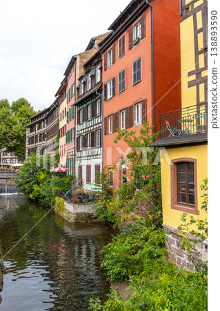 Colorful houses along canal in Petite France Strasbourg Colorful houses along canal in Petite France Strasbourg 138893590