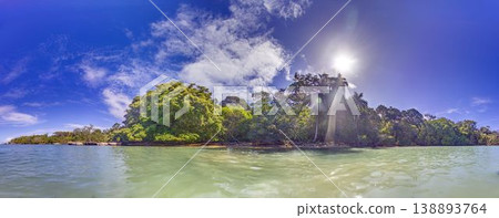 Tropical island coastline with jungle and sunlight Bocas del Toro Panama Tropical island coastline with jungle and sunlight Bocas del Toro Panama 138893764