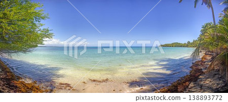 Tropical bay with shallow water and palm coastline Panama Tropical bay with shallow water and palm coastline Panama 138893772