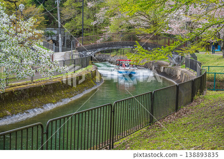 A sightseeing boat on the Lake Biwa Canal in springtime, Kyoto City 138893835
