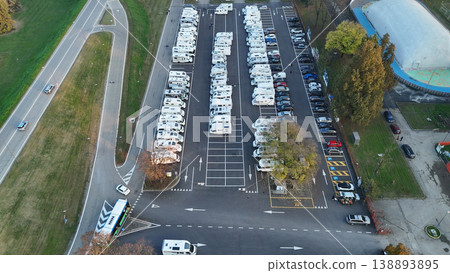 Piazzale Azzuri d'Italia in Cremona with an aerial view of tourist camper vans parked for travel and leisure in Italy Piazzale Azzuri d'Italia in Cremona with an aerial view of tourist camper vans parked for travel and leisure in Italy 138893895