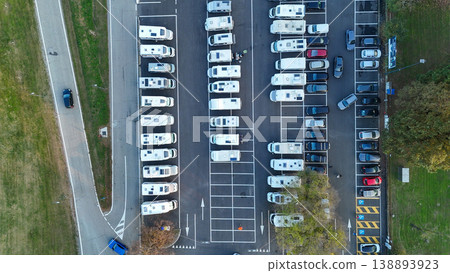 Aerial view of recreational vehicles parked in rows at Piazzale Azzuri d'Italia parking lot, Cremona, Italy Aerial view of recreational vehicles parked in rows at Piazzale Azzuri d'Italia parking lot, Cremona, Italy 138893923