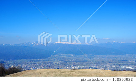 View of the Northern Alps towards Matsumoto from Takabocchi Plateau View of the Northern Alps towards Matsumoto from Takabocchi Plateau 138893928