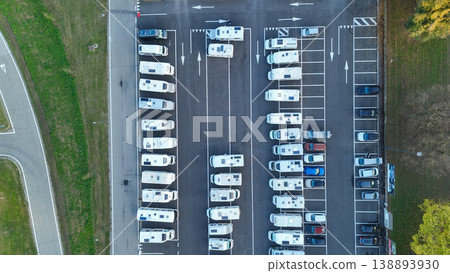 Aerial view of recreational vehicles parked in rows at Piazzale Azzuri d'Italia parking lot, Cremona, Italy Aerial view of recreational vehicles parked in rows at Piazzale Azzuri d'Italia parking lot, Cremona, Italy 138893930
