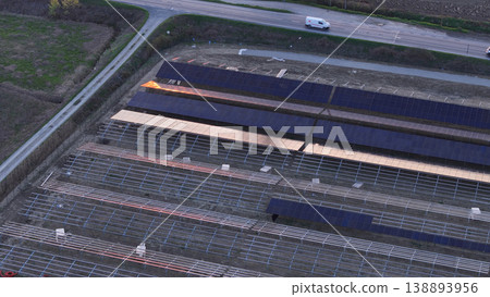 Building large solar panels farm for agrovoltaic energy production Building large solar panels farm for agrovoltaic energy production 138893956