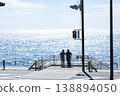 The sea beyond the pedestrian crossing in front of Shonan Kamakura High School 138894050