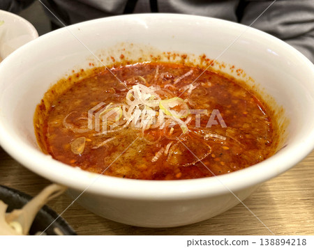 Spicy dipping sauce for tsukemen - the entire extremely spicy red soup Spicy dipping sauce for tsukemen - the entire extremely spicy red soup 138894218