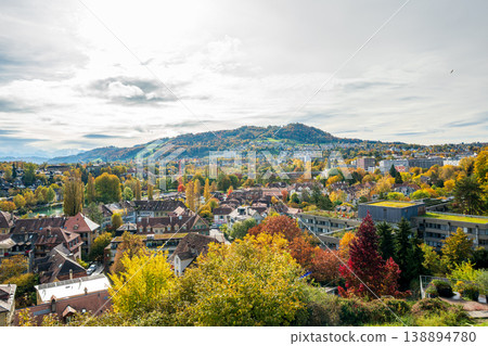 An autumnal scene of Bern's Old Town with the Aare River and Mount Gulten in the background. Bern Canton, Switzerland 138894780