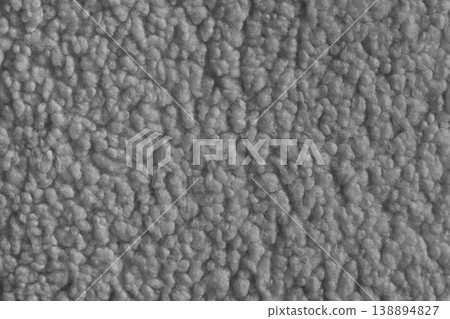 Gray color soft faux fur cloth texture with fluffy plush surface for cozy fabric backgrounds 138894827
