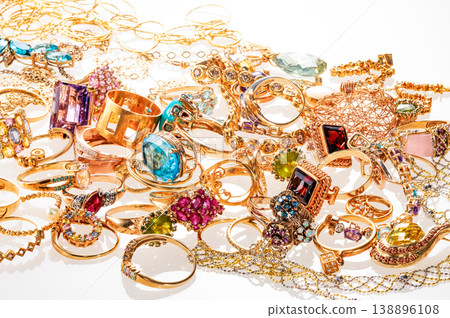 A mountain of vintage jewelry. The asset value of gold and images of buying, appraising, and estate liquidation. 138896108