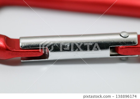 Macro photography of the gate portion of a carabiner Macro photography of the gate portion of a carabiner 138896174