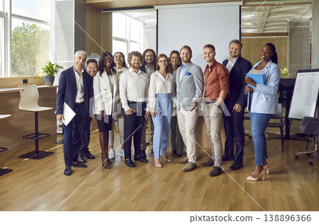 Portrait of diverse business people standing on a meeting and looking at the camera. 138896366