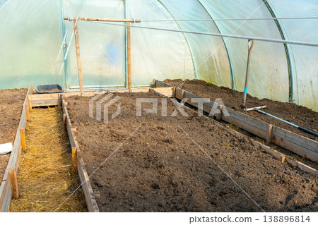 Empty and clean greenhouse ready for planting. Empty and clean greenhouse ready for planting. 138896814