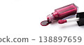 Close up closed cherry lip gloss tube on white background 138897659