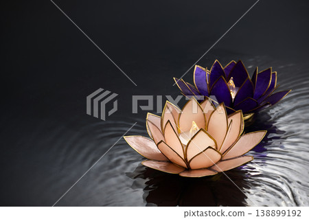 Vesak day. Floating lotus candle lanterns creating sacred ripples Vesak day. Floating lotus candle lanterns creating sacred ripples 138899192