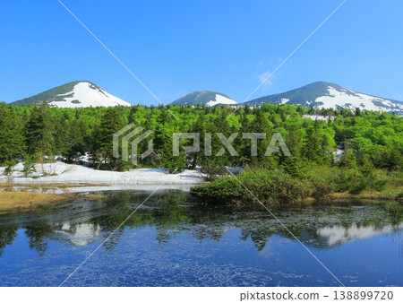 Hakkoda Mountains reflected in a pond Hakkoda Mountains reflected in a pond 138899720
