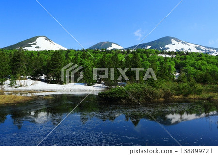 Hakkoda Mountains reflected in a pond 138899721