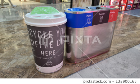London UK - 07.01.2025 Modern recycling station in a shopping mall with separate bins for coffee cups, liquids, lids, paper, plastic, and general waste promoting sustainable waste management and London UK - 07.01.2025 Modern recycling station in a shopping mall with separate bins for coffee cups, liquids, lids, paper, plastic, and general waste promoting sustainable waste management and 138900163