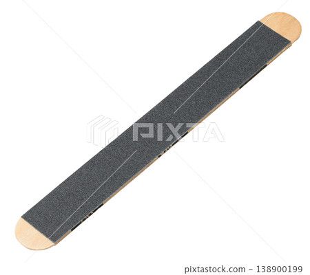 Nail file on a wooden base with a black fine-grained abrasive coating Nail file on a wooden base with a black fine-grained abrasive coating 138900199