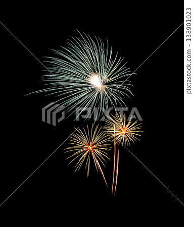 Green and yellow fireworks exploding on black sky Green and yellow fireworks exploding on black sky 138901023