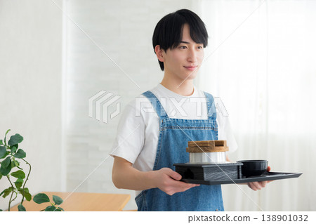 Clerk carrying meals 138901032