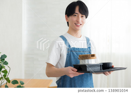 Clerk carrying meals Clerk carrying meals 138901034