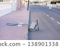 Fallen by storm road sign in the city 138901338