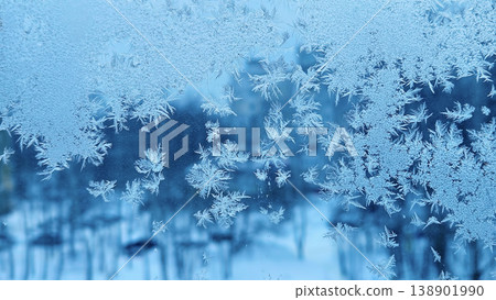 Natural ice patterns on winter window 138901990