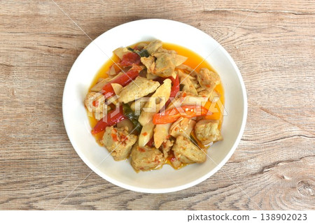 spicy stir fried slice bamboo shoot and Grouper fish ball with curry on plate spicy stir fried slice bamboo shoot and Grouper fish ball with curry on plate 138902023