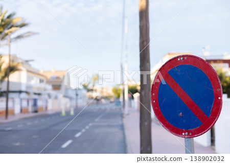 No parking traffic sign symbol on a street. No parking traffic sign symbol on a street. 138902032