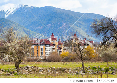 buildings in bansko, snowy pirin peaks in bulgaria buildings in bansko, snowy pirin peaks in bulgaria 138902036