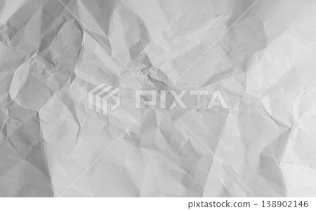 Old crumpled paper sheet with torn edges and weathered texture. Blank white background ideal effect. Old crumpled paper sheet with torn edges and weathered texture. Blank white background ideal effect. 138902146