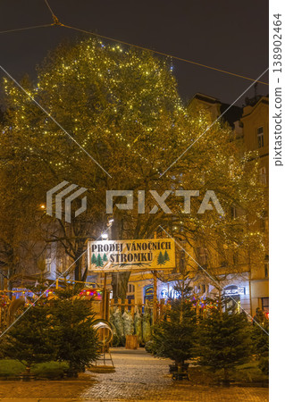 Prague Christmas tree market at night with festive lights Prague Christmas tree market at night with festive lights 138902464